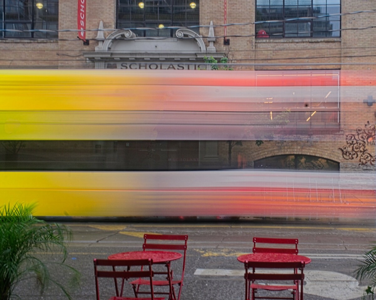 Streetcar passing by on a rainy afternoon.