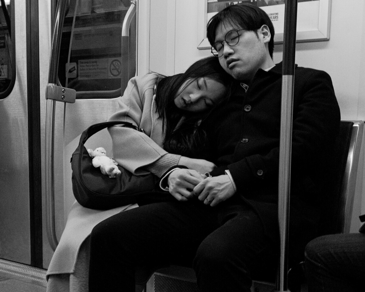 Sleepy Subway Riders
